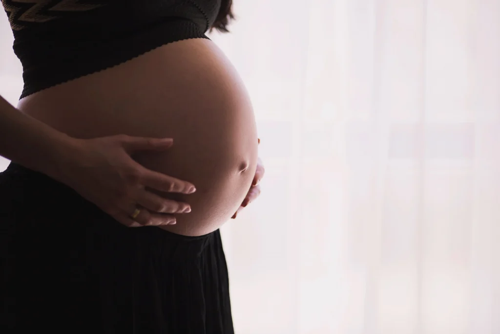 a pregnant woman undergoing hormonal changes